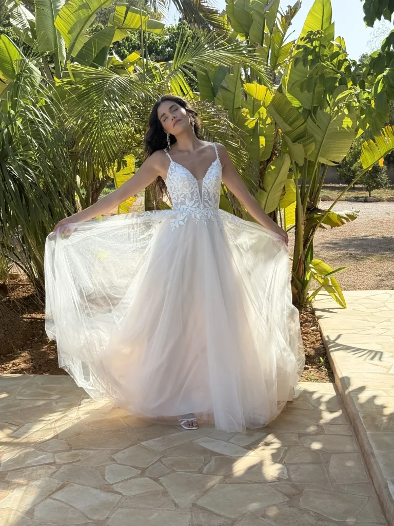 Bride in a tropical destination wedding setting by Liz Patey